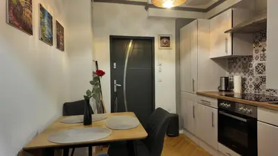 Küche/Küchenzeile in der Unterkunft Cozy City Apartment - U3 Johnstraße & Stadthalle