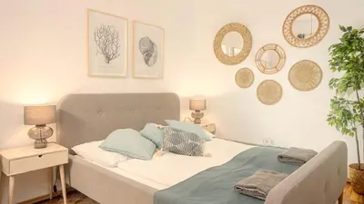 Ein Bett oder Betten in einem Zimmer der Unterkunft Near City Center - 3min walk to U4 Metro