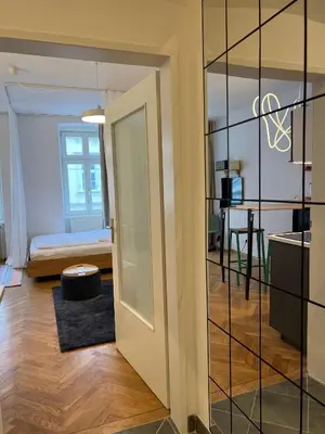 Ein Bett oder Betten in einem Zimmer der Unterkunft Schickes Apartment nähe AKH-MedUni - Währingerpark 24-7 check in
