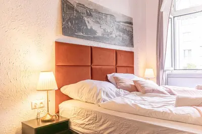 Ein Bett oder Betten in einem Zimmer der Unterkunft Bright 2BR Apartment in Central Vienna