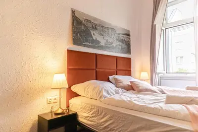 Ein Bett oder Betten in einem Zimmer der Unterkunft Bright 2BR Apartment in Central Vienna