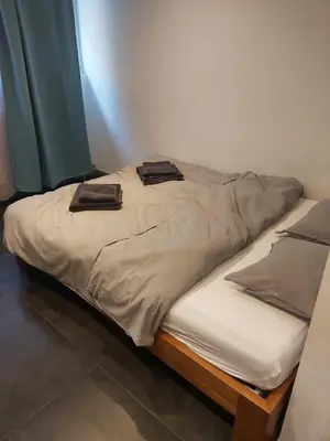 Ein Bett oder Betten in einem Zimmer der Unterkunft Cozy room in Favoriten