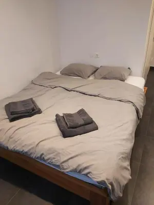 Ein Bett oder Betten in einem Zimmer der Unterkunft Cozy room in Favoriten