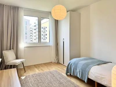 Ein Bett oder Betten in einem Zimmer der Unterkunft 70m2 Apartment near Kirschblütenpark - UNO-City - Vienna International School