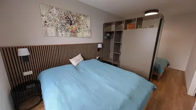 Ein Bett oder Betten in einem Zimmer der Unterkunft Fountain Suite Vienna - Garage, U-Bahn Nähe