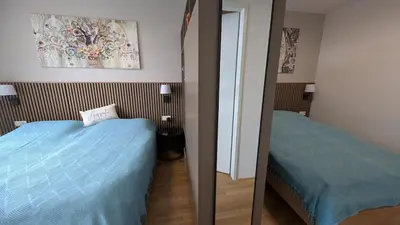Ein Bett oder Betten in einem Zimmer der Unterkunft Fountain Suite Vienna - Garage, U-Bahn Nähe