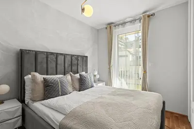 Ein Bett oder Betten in einem Zimmer der Unterkunft Spacious 3-BR - Balcony - Onsite Parking 19,90 per Day