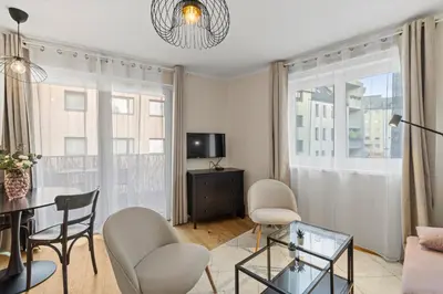 TV/Unterhaltungsangebot in der Unterkunft Modern 1BR near Meidling Metro - Free Parking