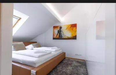 Ein Bett oder Betten in einem Zimmer der Unterkunft Vienna City Suites