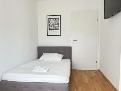 Ein Bett oder Betten in einem Zimmer der Unterkunft ampm Grasbergergasse - Coliving Vienna I Monthly Stays