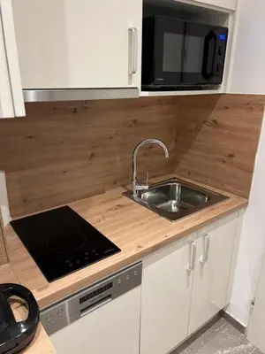 Küche/Küchenzeile in der Unterkunft Apartment near Metro & Netflix - Kingsize Bed