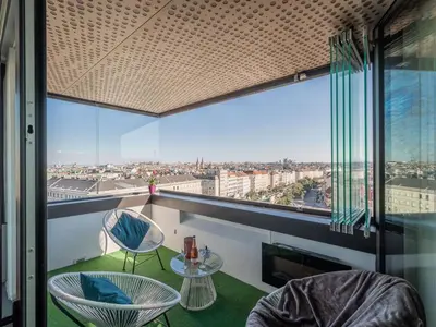 Ein Balkon oder eine Terrasse in der Unterkunft Apartment Skyflats Sun View by Interhome