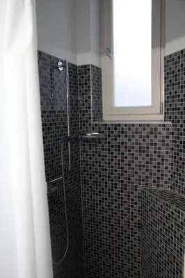 Ein Badezimmer in der Unterkunft Apartment Wohnen am Augarten by Interhome