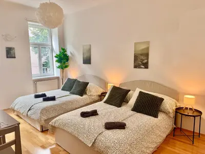 Ein Bett oder Betten in einem Zimmer der Unterkunft Central Long-Term Apartment