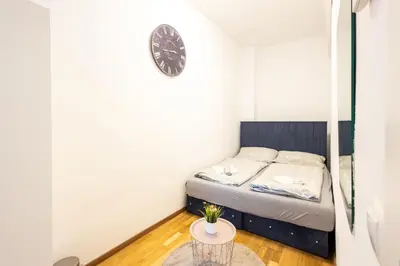 Ein Bett oder Betten in einem Zimmer der Unterkunft Deluxe Apart ROOM