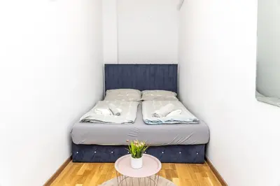 Ein Bett oder Betten in einem Zimmer der Unterkunft Deluxe Apart ROOM