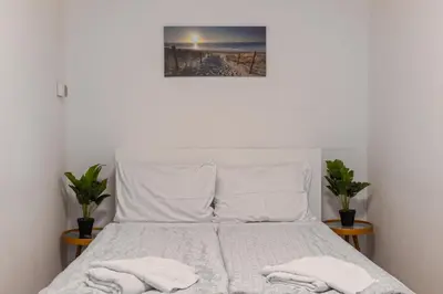 Ein Bett oder Betten in einem Zimmer der Unterkunft Budget Private Rooms Near Danube & Millennium Tower, Long Stay