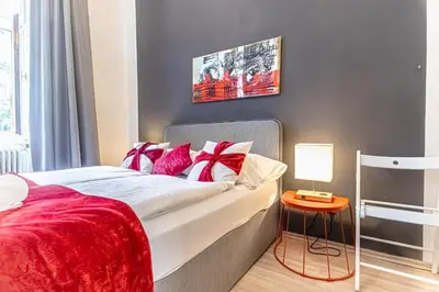 Ein Bett oder Betten in einem Zimmer der Unterkunft 10-Min to Westbahnhof, Modern Hotel Rooms with TV, Wi-Fi