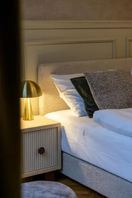 Ein Bett oder Betten in einem Zimmer der Unterkunft josef's home l Historic Dream in Prime Location