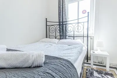 Ein Bett oder Betten in einem Zimmer der Unterkunft Comfortable Private Rooms Near Millennium Tower for Long Stays