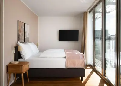 Ein Bett oder Betten in einem Zimmer der Unterkunft Limehome Vienna Vivenotgasse