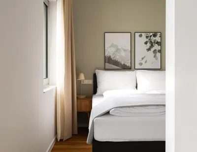 Ein Bett oder Betten in einem Zimmer der Unterkunft Limehome Vienna Vivenotgasse