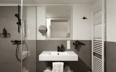 Ein Badezimmer in der Unterkunft Limehome Vienna Vivenotgasse