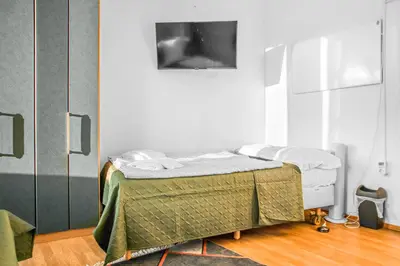 Ein Bett oder Betten in einem Zimmer der Unterkunft Comfortable 2BR Apartment Near Millennium Tower Long Stay