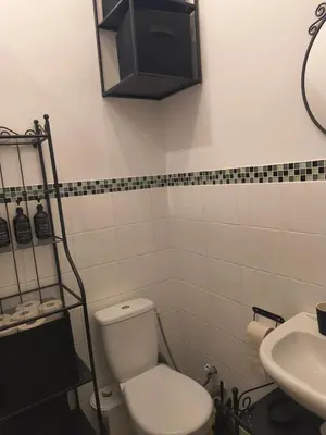 Ein Badezimmer in der Unterkunft Małe M