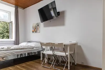 TV/Unterhaltungsangebot in der Unterkunft Modern 1BR Apartment Close to the Danube River