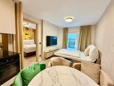 Ein Bett oder Betten in einem Zimmer der Unterkunft Luxury Modern Apartment near Metro