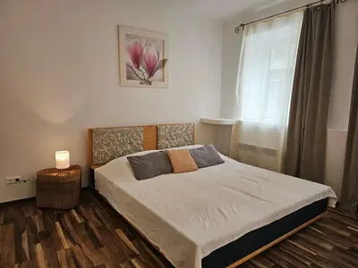Ein Bett oder Betten in einem Zimmer der Unterkunft Chopin Apartment