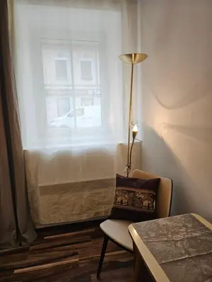 Ein Bett oder Betten in einem Zimmer der Unterkunft Chopin Apartment