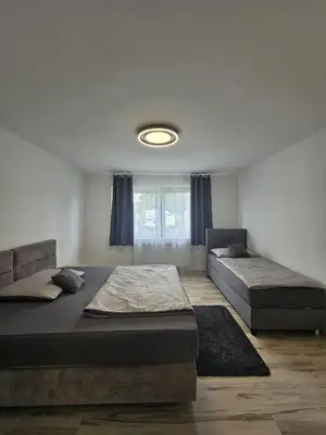 Ein Bett oder Betten in einem Zimmer der Unterkunft Villa Stay & Sleep
