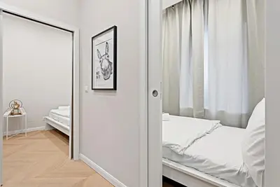 Ein Bett oder Betten in einem Zimmer der Unterkunft Kaiser Apartments - Central Vienna