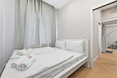 Ein Bett oder Betten in einem Zimmer der Unterkunft Kaiser Apartments - Central Vienna