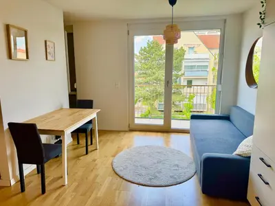 Ein Sitzbereich in der Unterkunft Modern Stylish Apartment with Balcony near SCS