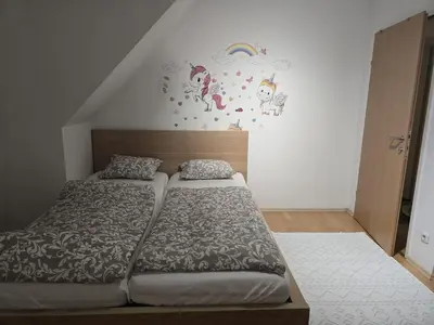 Ein Bett oder Betten in einem Zimmer der Unterkunft Beautiful house 15 minutes from Schwechat Airport