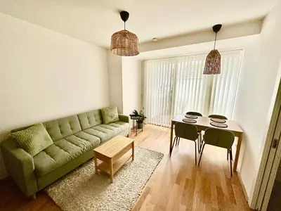 Ein Sitzbereich in der Unterkunft Brand-New Apartment close to city center