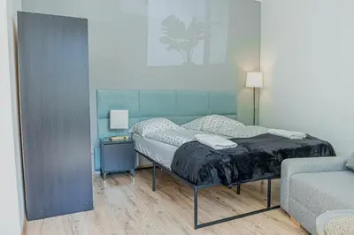 Ein Bett oder Betten in einem Zimmer der Unterkunft Cozy Long Stay Close to Danube Canal & Praterstern