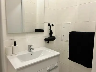 Ein Badezimmer in der Unterkunft Cosy Stylish Long-Term Apartment