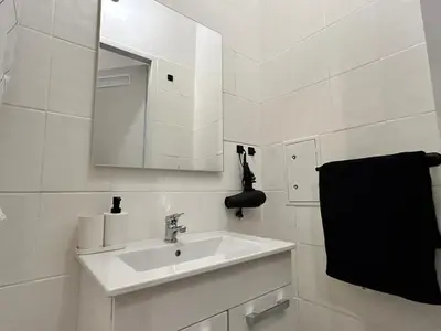 Ein Badezimmer in der Unterkunft Cosy Stylish Long-Term Apartment
