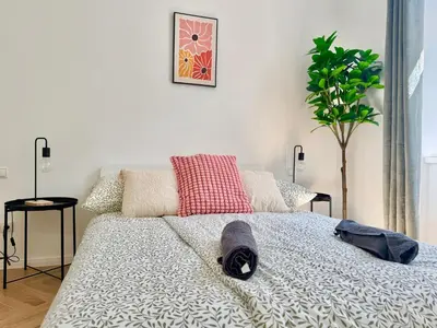 Ein Bett oder Betten in einem Zimmer der Unterkunft Renovated Stylish Apartment