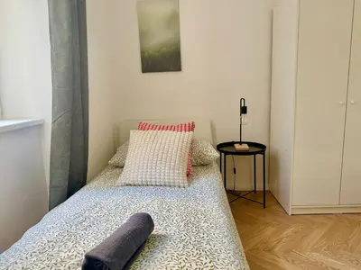 Ein Bett oder Betten in einem Zimmer der Unterkunft Renovated Stylish Apartment