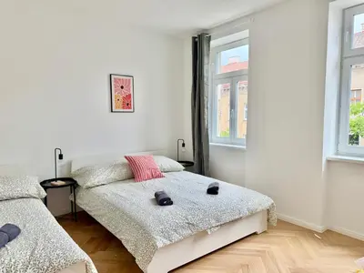 Ein Bett oder Betten in einem Zimmer der Unterkunft Renovated Stylish Apartment