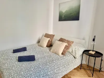 Ein Bett oder Betten in einem Zimmer der Unterkunft Renovated Stylish Apartment