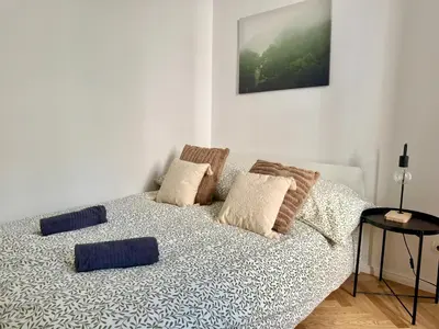 Ein Bett oder Betten in einem Zimmer der Unterkunft Renovated Stylish Apartment