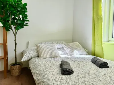 Ein Bett oder Betten in einem Zimmer der Unterkunft Schönbrunn Cozy Studio