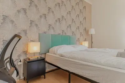 Ein Bett oder Betten in einem Zimmer der Unterkunft Cozy 2-Bedroom Apartment Near Prater & Danube