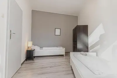 Ein Bett oder Betten in einem Zimmer der Unterkunft Cozy 2-Bedroom Apartment Near Prater & Danube